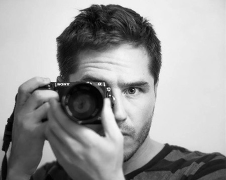Jeremy Moore photographing himself with his camera